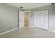 Bedroom with closet and door to hallway at 6 Baytree Cir, Ormond Beach, FL 32176