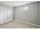 Bedroom with window and built-in closet at 6 Baytree Cir, Ormond Beach, FL 32176