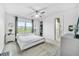 Spacious bedroom with ample natural light and a ceiling fan at 1401 S Palmetto Ave # 618, Daytona Beach, FL 32114