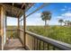 Relaxing screened balcony overlooking lush landscape and waterways at 1401 S Palmetto Ave # 618, Daytona Beach, FL 32114