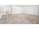 Open living room with entryway view and carpeted floor at 1702 Myrtlebrooke Dr, Edgewater, FL 32141