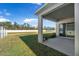 Covered patio with sliding glass doors at 1702 Myrtlebrooke Dr, Edgewater, FL 32141