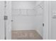 Large walk-in closet with wire shelving and hanging rods at 1702 Myrtlebrooke Dr, Edgewater, FL 32141