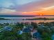 Luxury waterfront home at sunset at 2627 John Anderson Dr, Ormond Beach, FL 32176