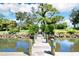 Wooden walkway dock leading to waterfront at 2627 John Anderson Dr, Ormond Beach, FL 32176