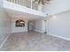 Spacious living room with high ceilings and tile floors at 3072 Ocean Shore Blvd, Ormond Beach, FL 32176