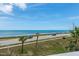 Ocean view from rooftop deck, showing beach and highway at 3072 Ocean Shore Blvd, Ormond Beach, FL 32176