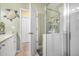 Bright bathroom with glass shower enclosure and updated vanity at 35 Saddlers Run, Ormond Beach, FL 32174