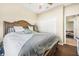 King-size bed in spacious bedroom with access to another room at 35 Saddlers Run, Ormond Beach, FL 32174