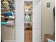 White closet doors opening to a bedroom with wood floors at 35 Saddlers Run, Ormond Beach, FL 32174