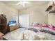 Spacious bedroom with a large closet and flat-screen TV at 35 Saddlers Run, Ormond Beach, FL 32174