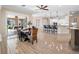 Open concept dining room with large sliding glass doors leading to a patio at 38338 Timberlane Dr, Umatilla, FL 32784