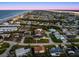 Aerial view of a house near the beach, showcasing the surrounding neighborhood and oceanfront location at 110 Imperial Heights Dr, Ormond Beach, FL 32176