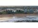 Aerial of beachfront property, showing building and beach at 2222 Ocean Shore Blvd # 102B, Ormond Beach, FL 32176