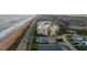 Aerial view of beachfront property and coastal road at 2222 Ocean Shore Blvd # 102B, Ormond Beach, FL 32176