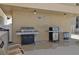 Community BBQ area with two grills at 2222 Ocean Shore Blvd # 102B, Ormond Beach, FL 32176