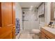 Updated bathroom with walk-in shower and modern vanity at 2222 Ocean Shore Blvd # 102B, Ormond Beach, FL 32176