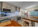 Modern kitchen featuring gray cabinets and white countertops at 2222 Ocean Shore Blvd # 102B, Ormond Beach, FL 32176