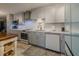 Newly remodeled kitchen with gray cabinets and white subway tile at 2222 Ocean Shore Blvd # 102B, Ormond Beach, FL 32176