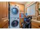 Laundry room with stackable washer and dryer at 2222 Ocean Shore Blvd # 102B, Ormond Beach, FL 32176