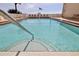 Steps leading into the refreshing community pool at 2222 Ocean Shore Blvd # 102B, Ormond Beach, FL 32176