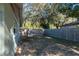 Large backyard area with wooden fence at 5700 E Fort King St, Ocala, FL 34470