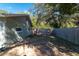 Spacious backyard with wooden fence at 5700 E Fort King St, Ocala, FL 34470
