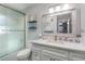 Clean bathroom, featuring white cabinets, a quartz countertop, and a shower/tub combo at 5700 E Fort King St, Ocala, FL 34470