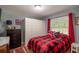 Bedroom with a double bed and white closet at 5700 E Fort King St, Ocala, FL 34470