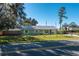 Single-story house with a lush front yard at 5700 E Fort King St, Ocala, FL 34470