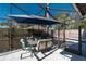 Screened patio with table and chairs for outdoor dining at 5700 E Fort King St, Ocala, FL 34470