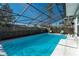 Relaxing screened pool area, perfect for outdoor enjoyment at 5700 E Fort King St, Ocala, FL 34470