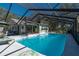 Refreshing screened pool and patio area at 5700 E Fort King St, Ocala, FL 34470