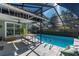 Enjoy this screened-in pool and patio area at 5700 E Fort King St, Ocala, FL 34470