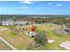 Aerial view showing a house on a large lot with a barn at 1045 Carter Rd, Deland, FL 32724