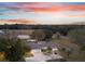 Aerial view of home at sunset, highlighting the property's size at 1045 Carter Rd, Deland, FL 32724