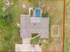 Aerial view showing home, pool, and surrounding land at 1045 Carter Rd, Deland, FL 32724