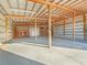 Spacious barn interior with high ceilings and concrete floor at 1045 Carter Rd, Deland, FL 32724