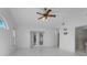 Large bedroom with tile floors and access to bathroom at 1045 Carter Rd, Deland, FL 32724