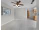 Simple dining area with tile floors and kitchen access at 1045 Carter Rd, Deland, FL 32724