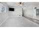 Large living room featuring tile flooring and a view to the backyard at 1045 Carter Rd, Deland, FL 32724