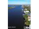 Aerial view of waterfront homes and canal at 105 Barrier Isle Dr, Ormond Beach, FL 32176