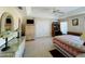 Bedroom with wicker furniture and built-in shelving at 105 Barrier Isle Dr, Ormond Beach, FL 32176