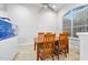 Charming dining area with wood table and four chairs at 1221 Harwick Ln, Ormond Beach, FL 32174