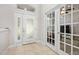 Bright entryway with double French doors at 1221 Harwick Ln, Ormond Beach, FL 32174