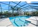 Enclosed pool with lake view and sun deck at 1221 Harwick Ln, Ormond Beach, FL 32174