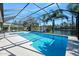 Screened pool with lake view and spacious patio at 1221 Harwick Ln, Ormond Beach, FL 32174