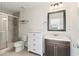 Bathroom boasts a walk-in shower and updated vanity at 1311 Hansberry Ln, Ormond Beach, FL 32174