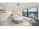 Bedroom with lake view and king-size bed at 1311 Hansberry Ln, Ormond Beach, FL 32174