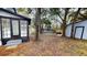 Spacious backyard with detached shed and privacy fence at 141 Kingston Ave, Daytona Beach, FL 32114